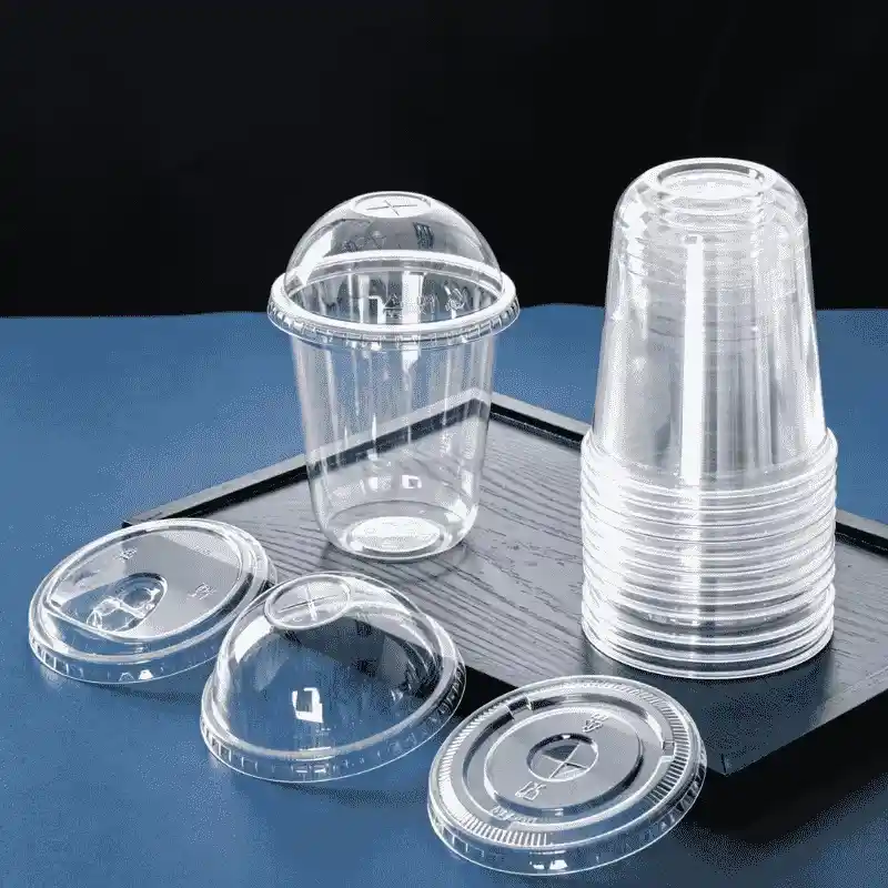 disposable clear plastic cup with a curved bottom and a curved lid disposable clear plastic cup with a curved bottom and a curved lid